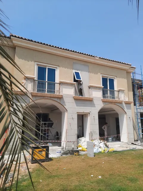 Window installation in progress: A site photograph from villa window work, showing the installation stage before the surrounding renovation was complete.